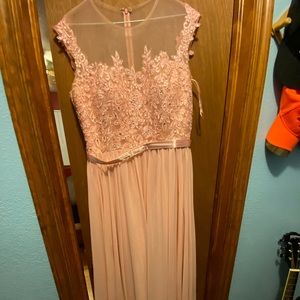 A dusty rose bridesmaid dress